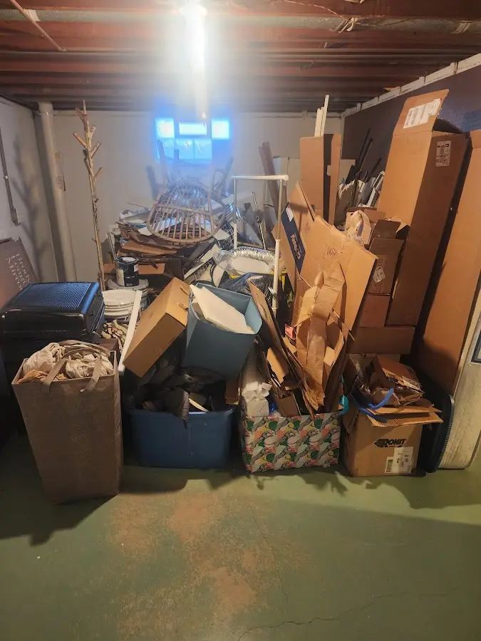 Roll-off dumpster container at job site for 15 Yard Dumpster Rental in Dearborn Heights